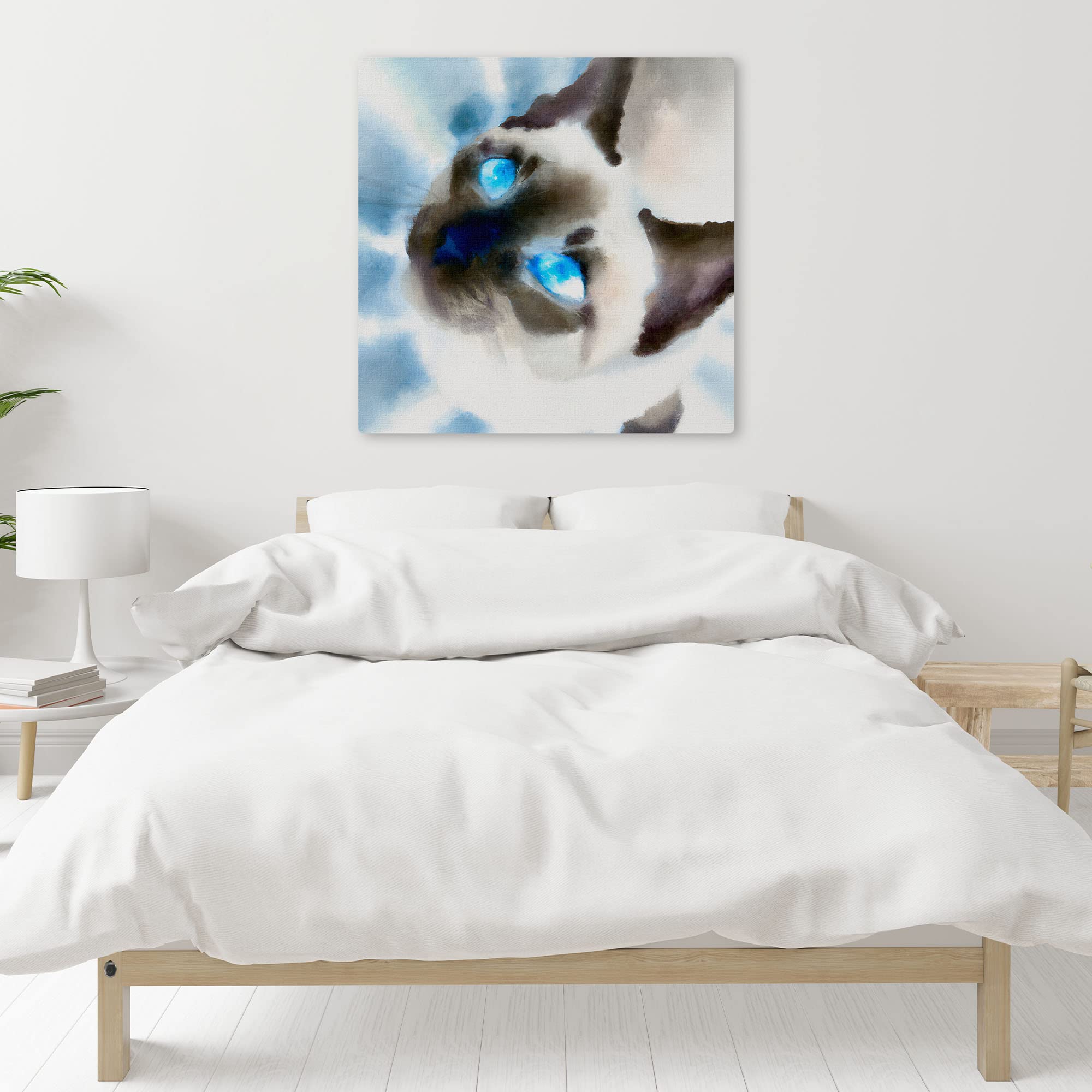 Close-up Siamese cat watercolor wall art with vivid blue eyes and soft brush strokes on square canvas above white bed