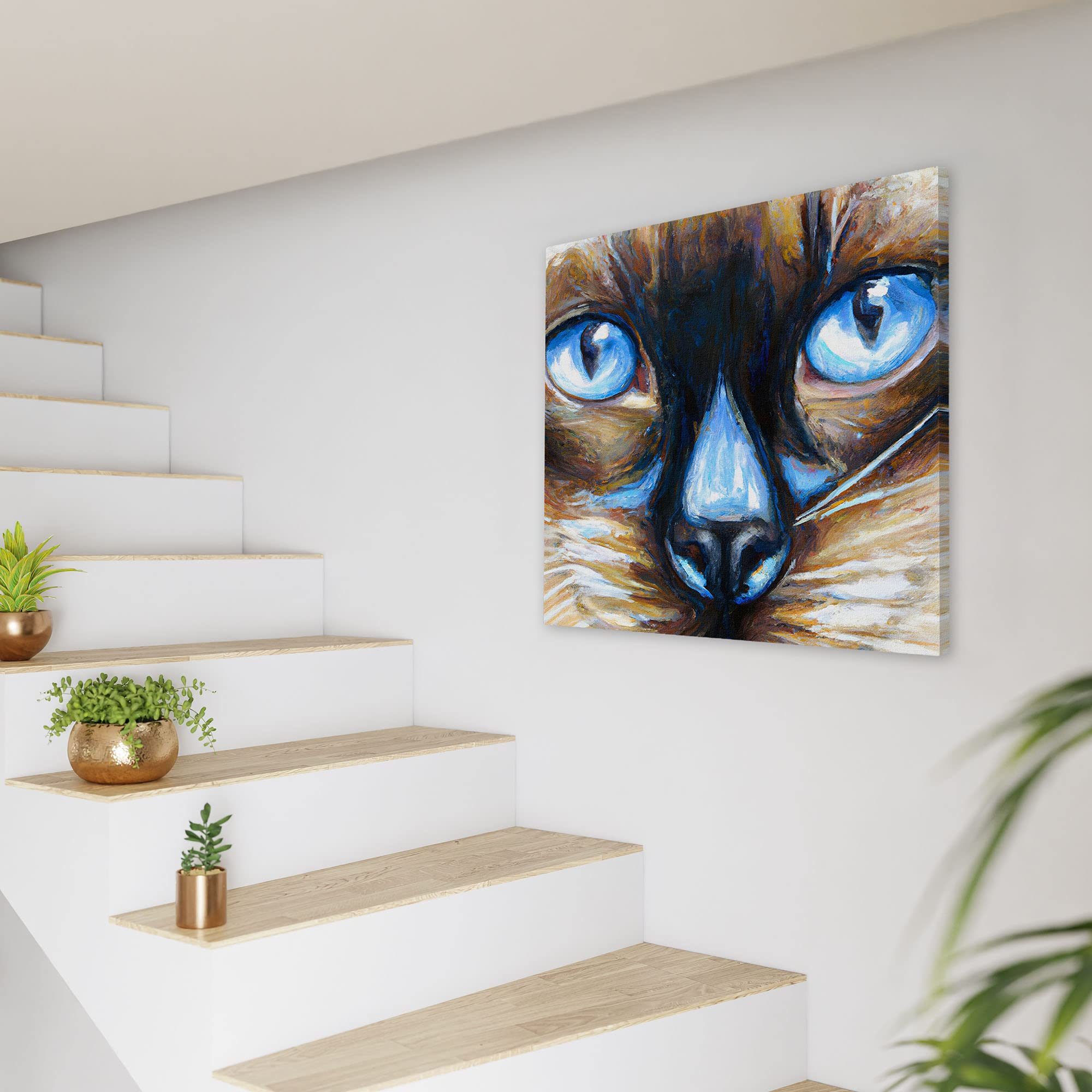 Close-up Siamese cat wall art with striking bright blue eyes and textured brush strokes on square canvas above modern staircase