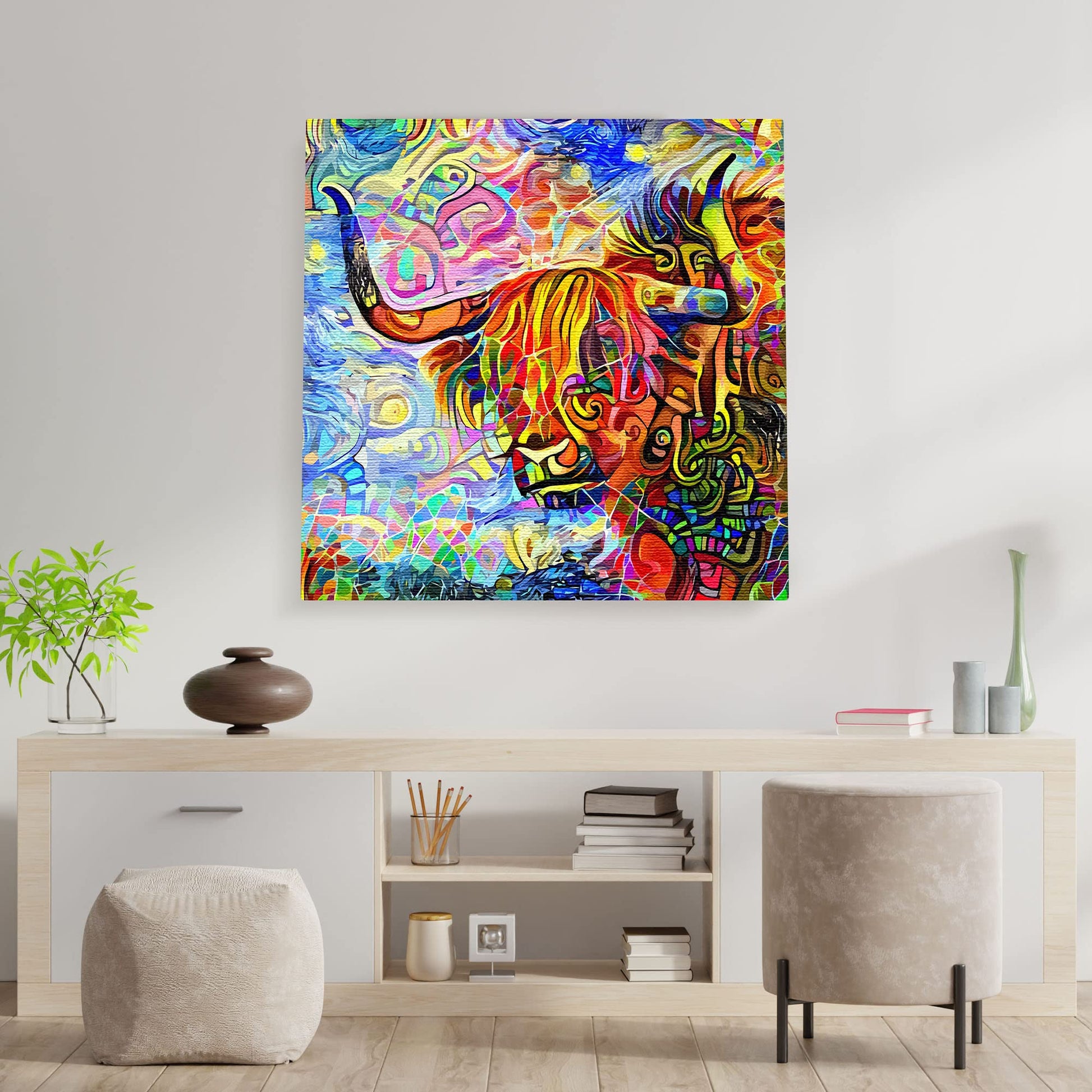 Colorful abstract Highland bull painting with swirling patterns on square canvas displayed on white wall above modern console table
