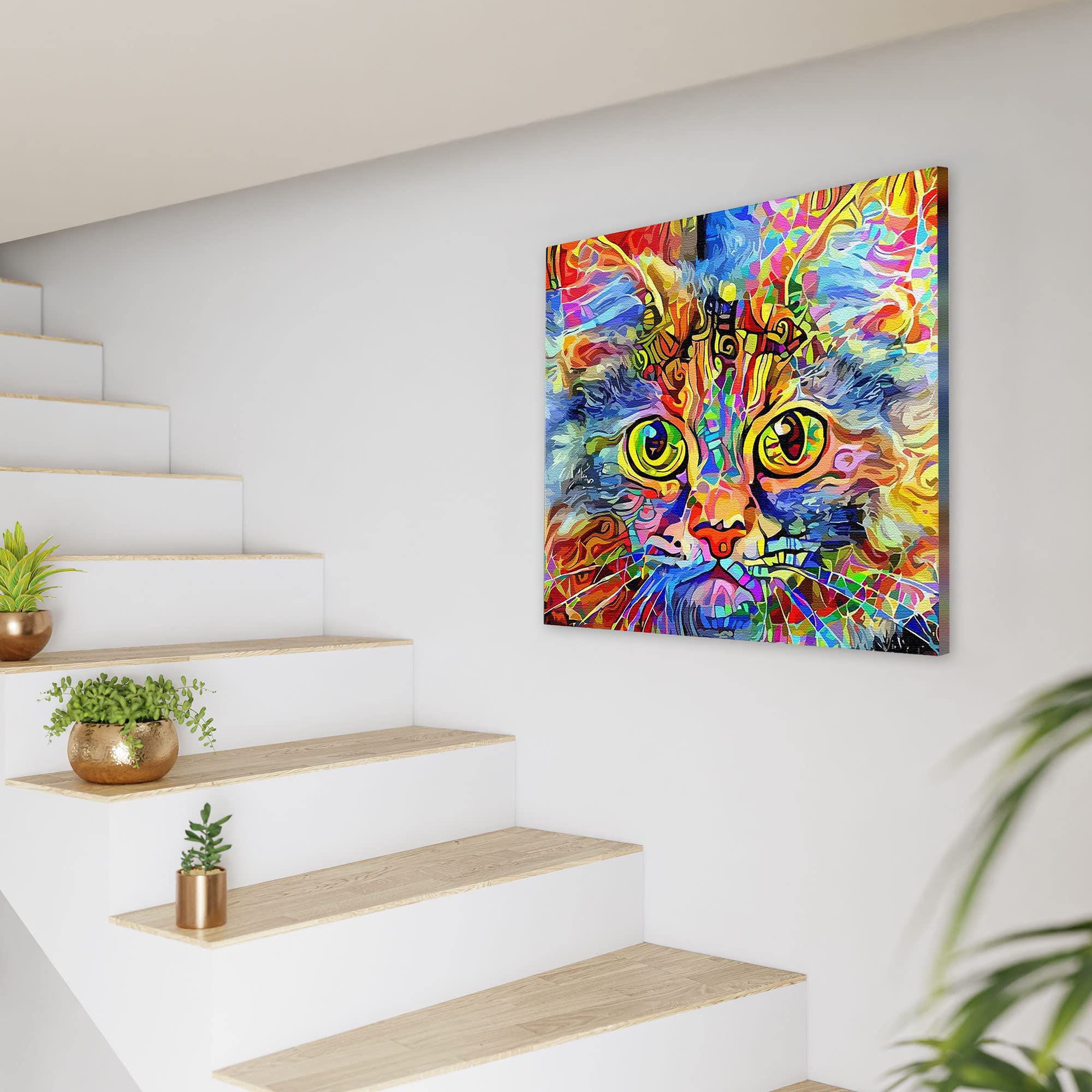 Bright cat art canvas with vivid multicolor abstract patterns and large expressive yellow-green eyes on square canvas above staircase