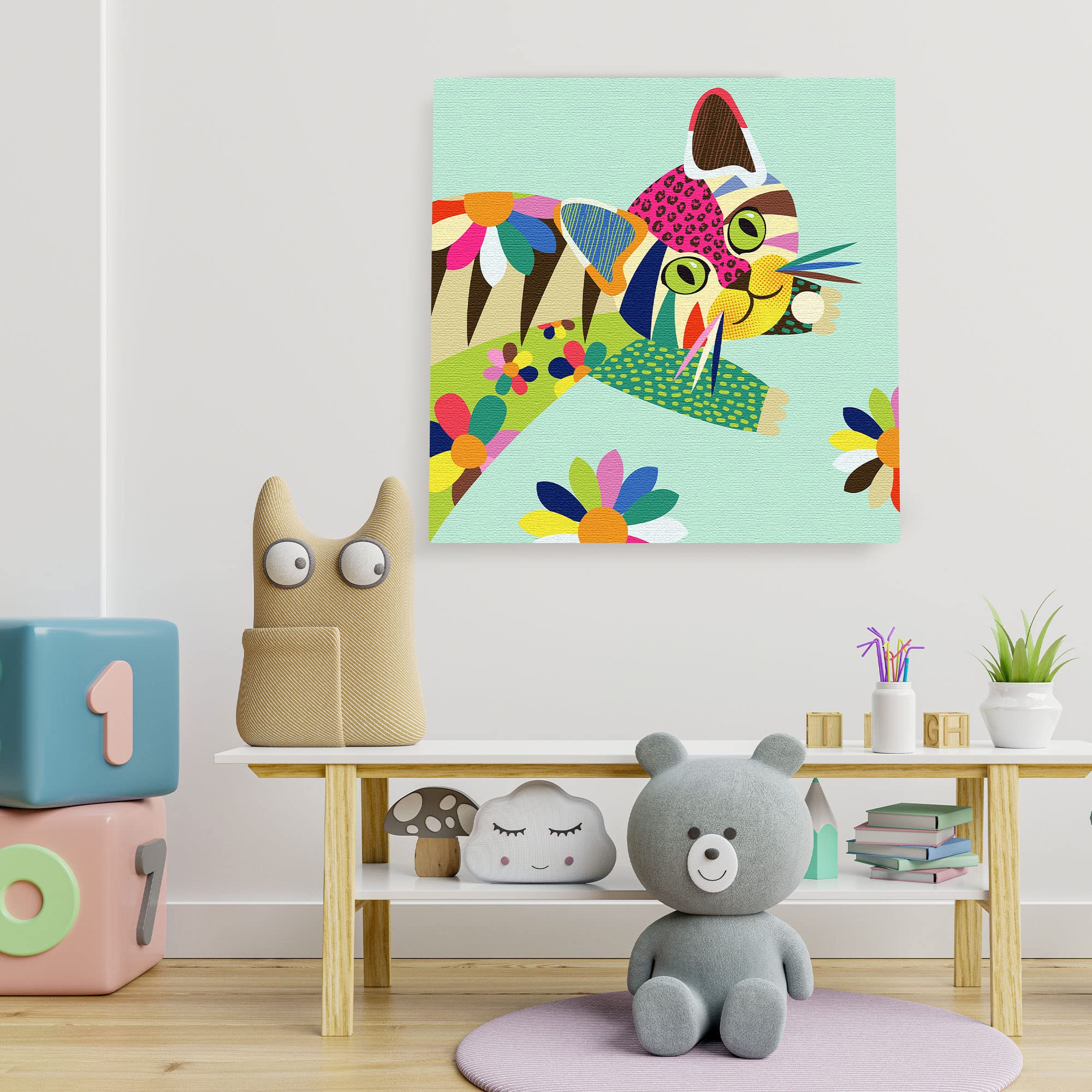 Colorful cute cat kitten wall art with vibrant geometric shapes and bold lines on pastel blue canvas in playful nursery room
