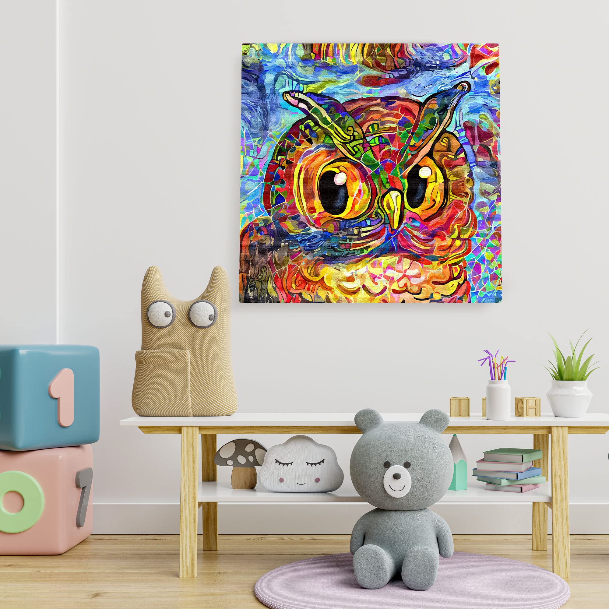 Vibrant abstract owl with colorful swirling patterns on square canvas wall art in playful children's room setting