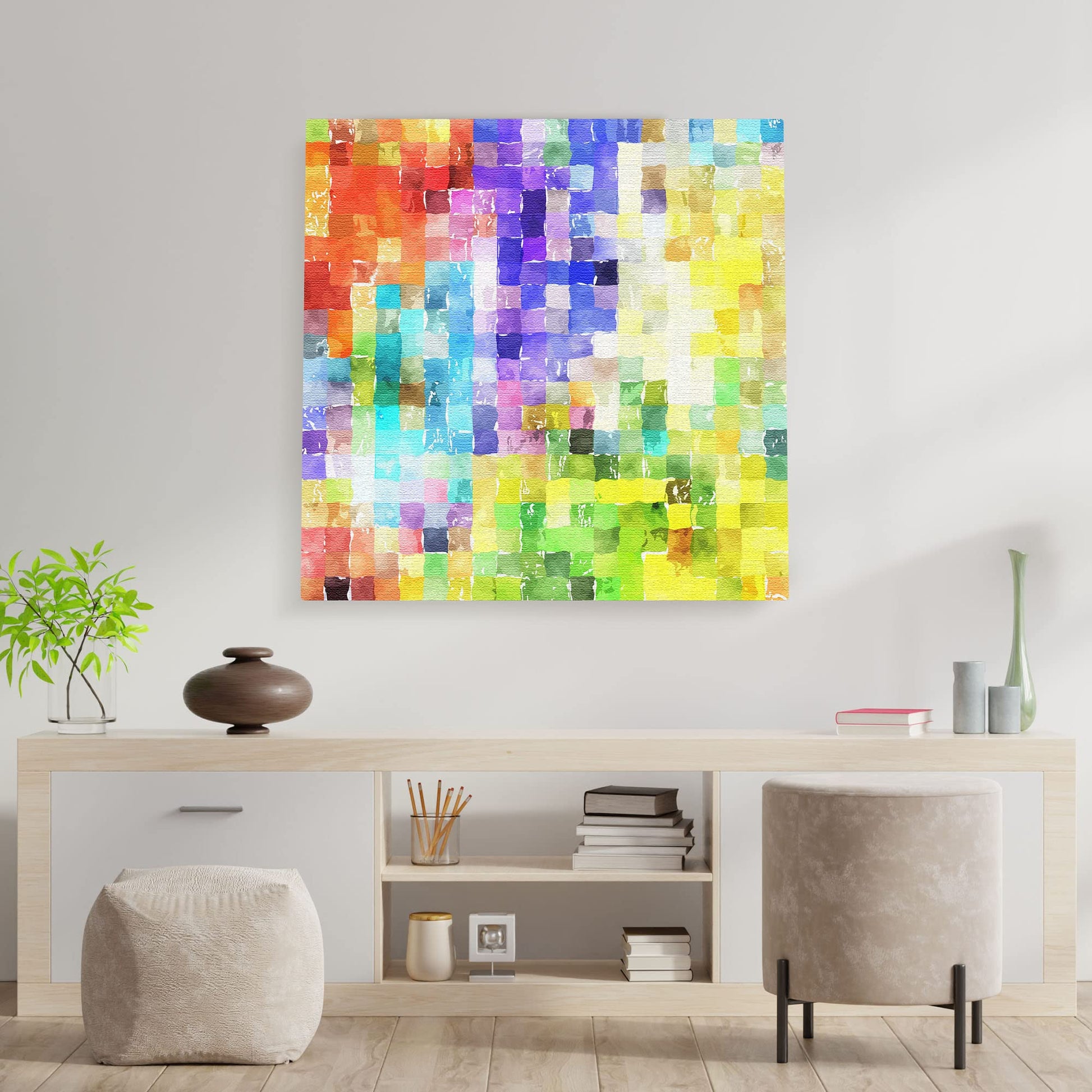 Colorful abstract watercolor mosaic wall art on square canvas displayed above modern console in bright minimalist room