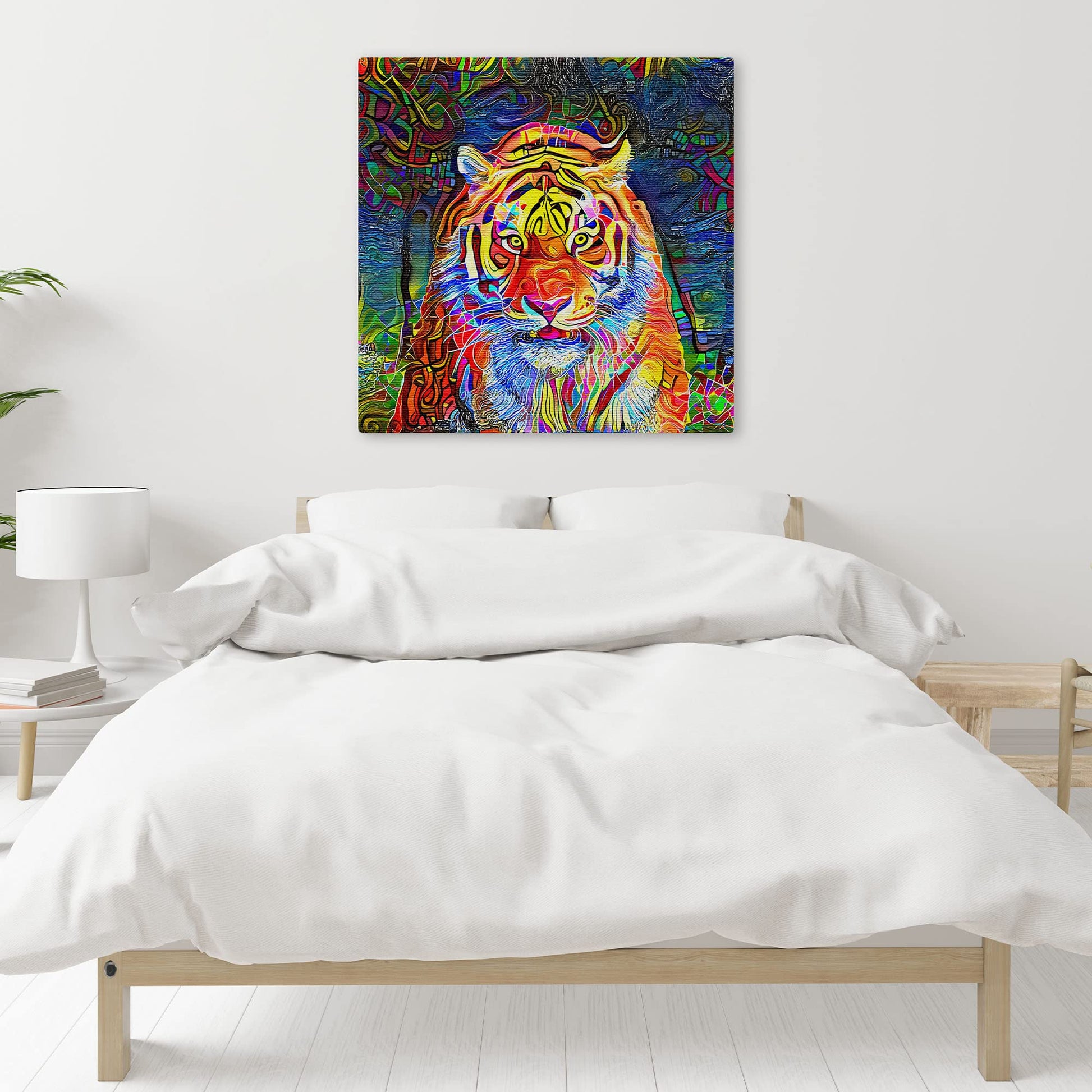 Abstract colorful tiger with vibrant geometric and swirling patterns on multicolor background printed on square canvas above bed in minimalist bedroom
