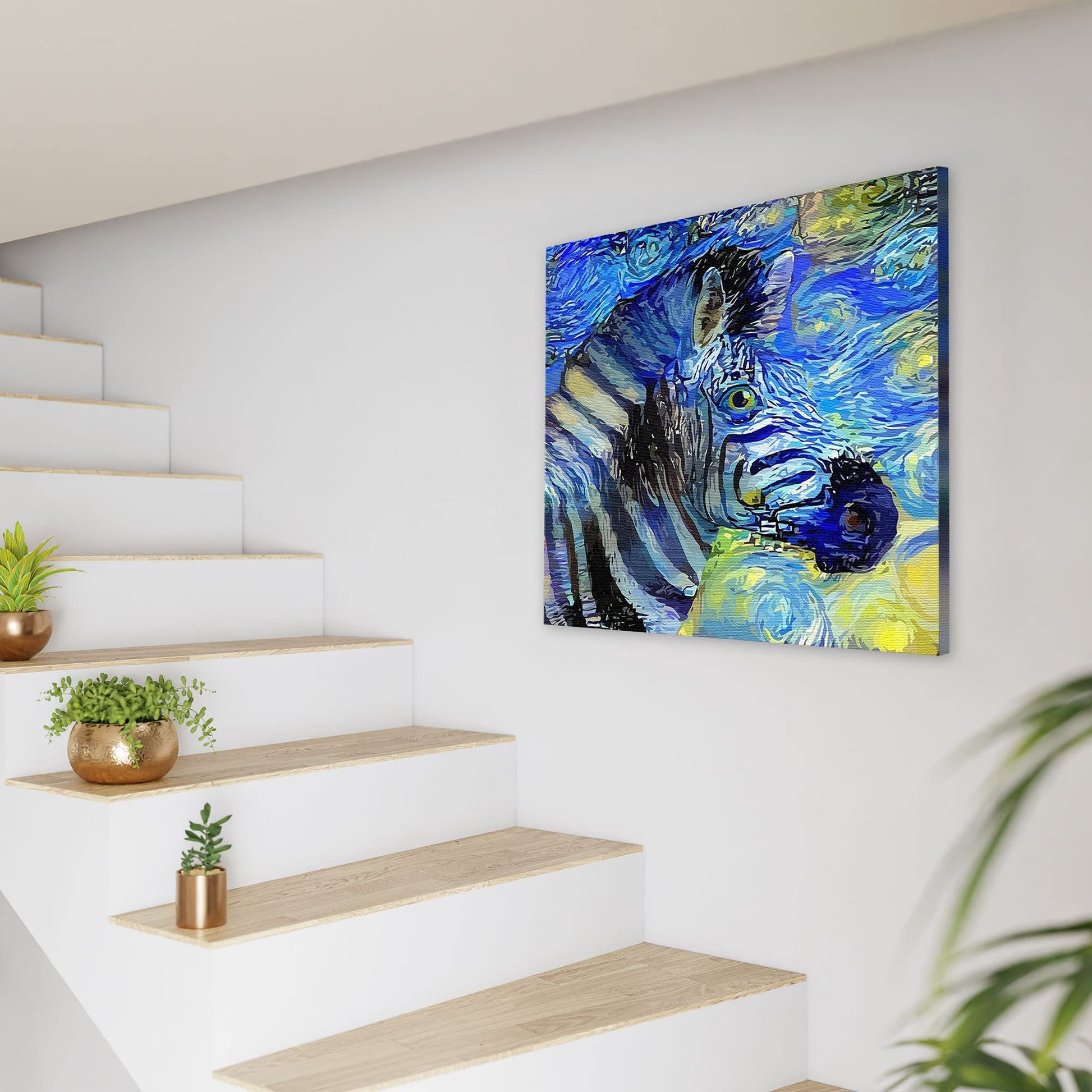 Abstract zebra portrait with swirling blue and yellow starry background printed on canvas hanging on white wall by staircase