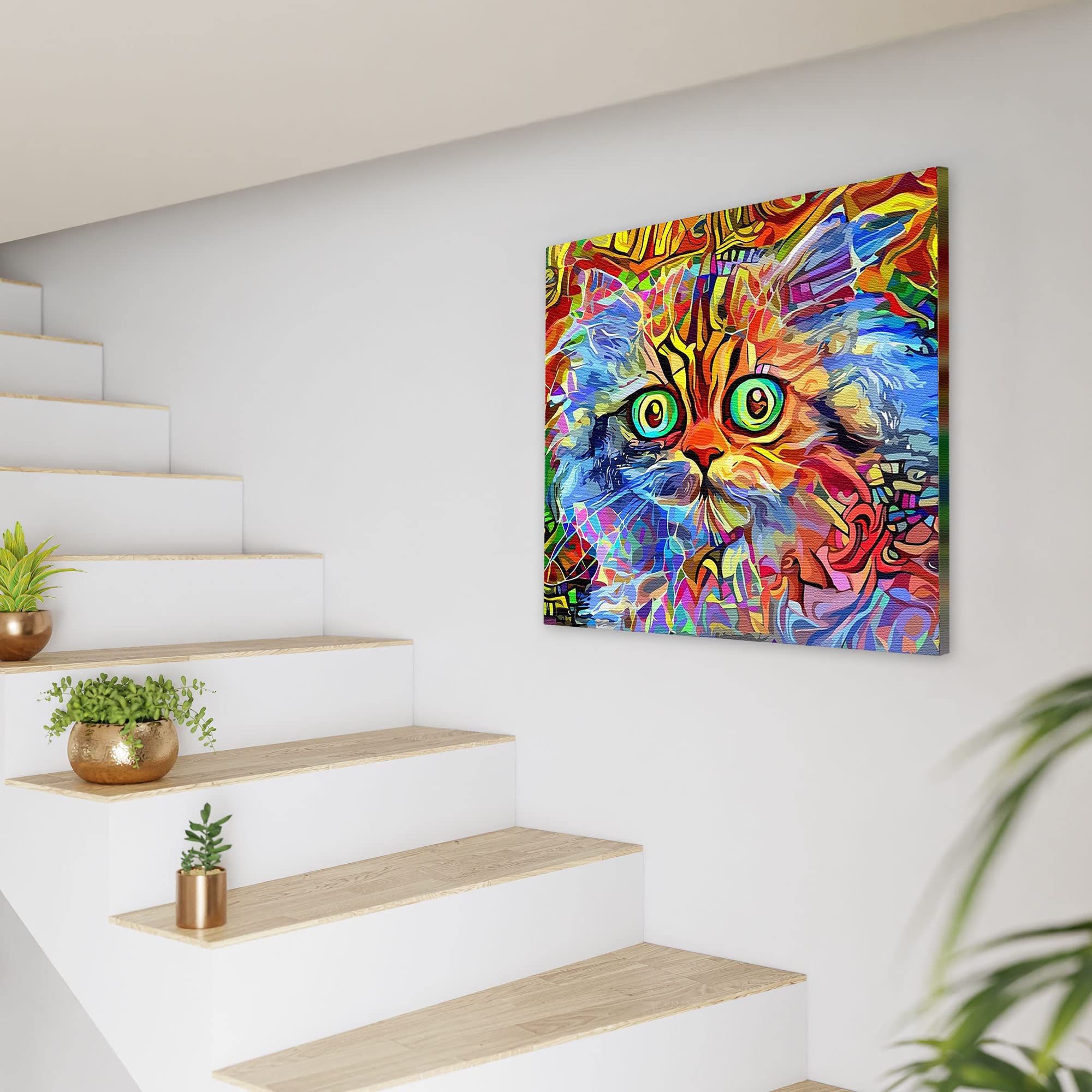 Vibrant multicolor cat wall art with abstract geometric patterns and wide green eyes on square canvas hanging by staircase