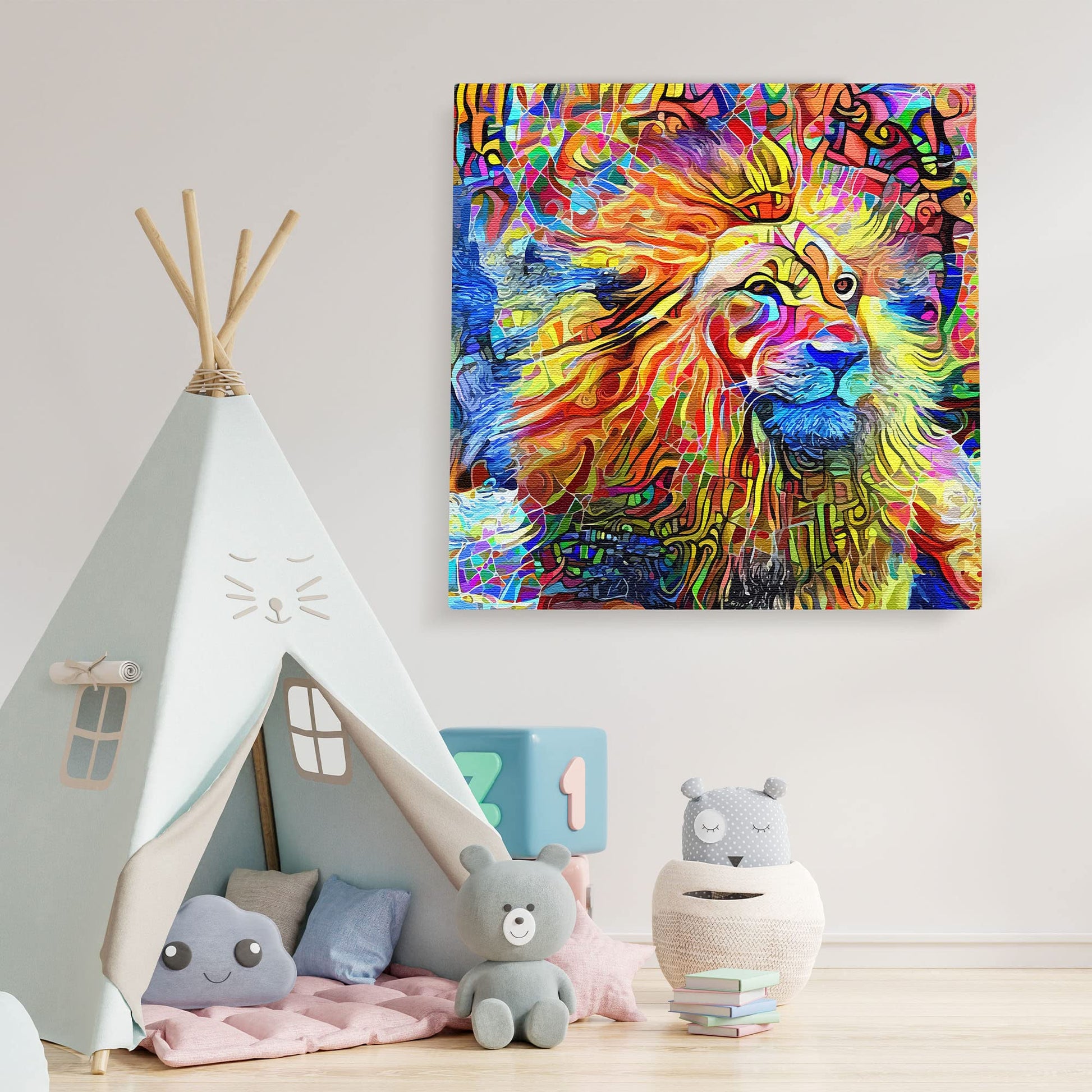 Colorful abstract lion artwork on square canvas displayed on white kids room wall above cozy play tent and plush toys