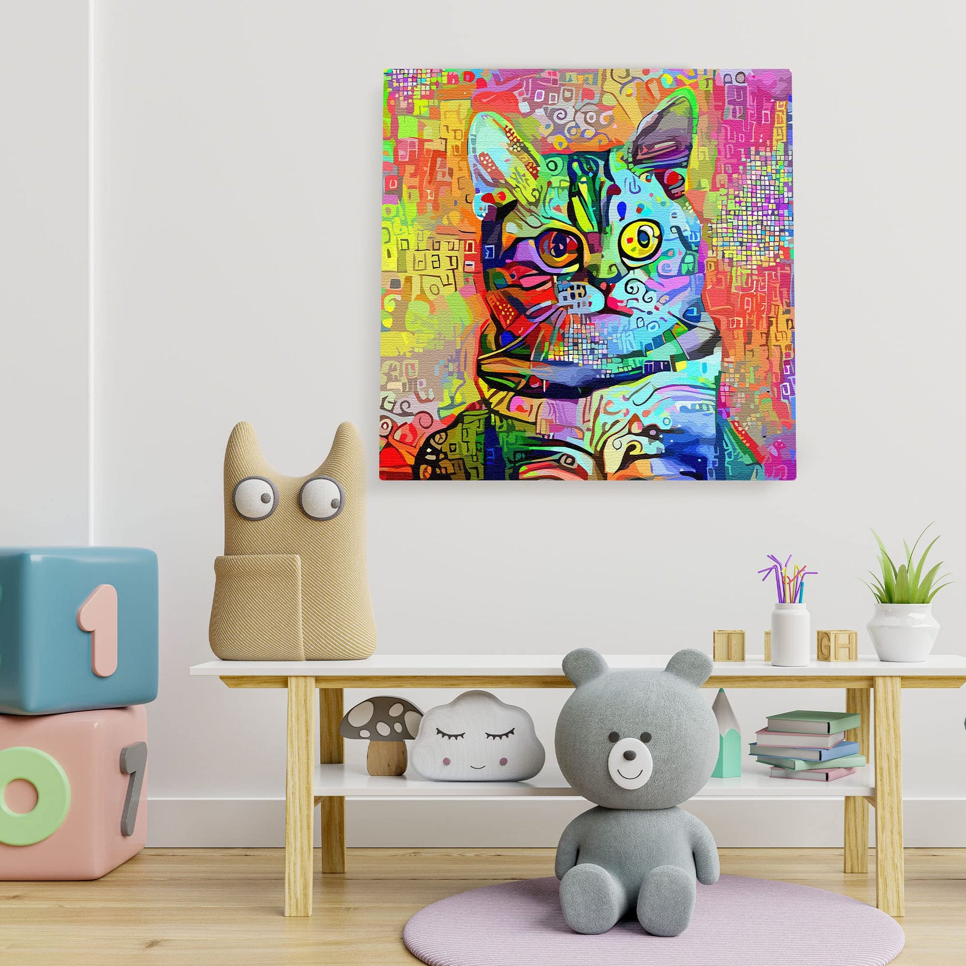 Bright mosaic cat wall art with vivid geometric patterns and expressive eyes displayed on white wall in playful kids room
