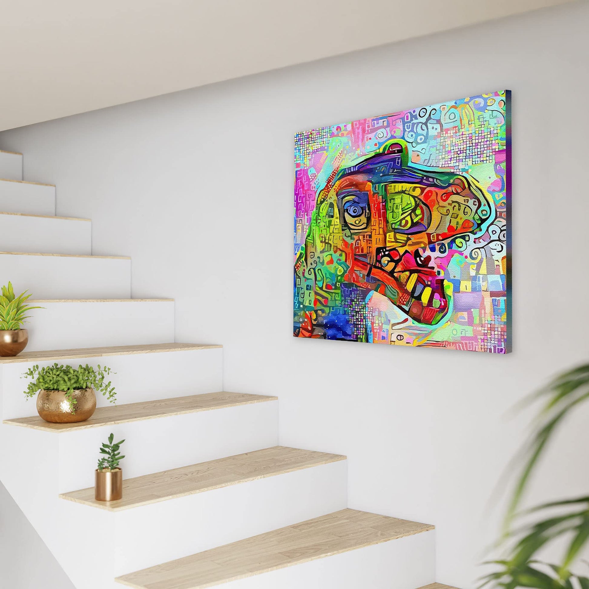 Colorful geometric mosaic T-Rex dinosaur art with vibrant abstract patterns on square canvas hanging on white wall near stairs