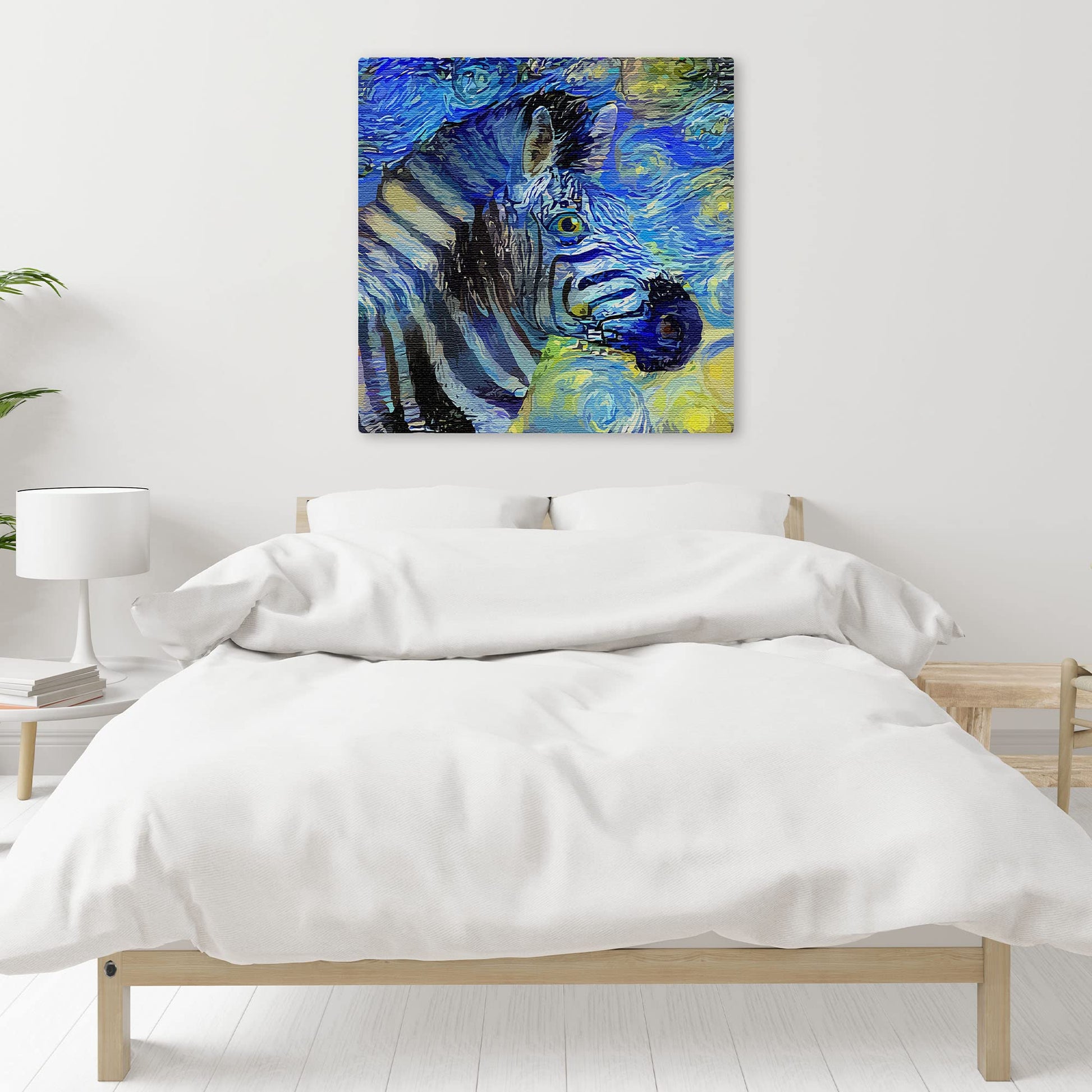 Abstract zebra portrait with swirling blue and yellow starry night style background printed on square canvas above bed