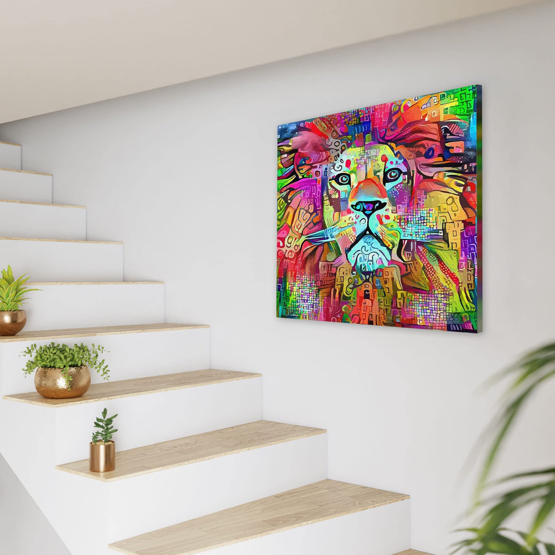Colorful abstract lion artwork on square canvas displayed on white wall near modern wooden stairs with plants
