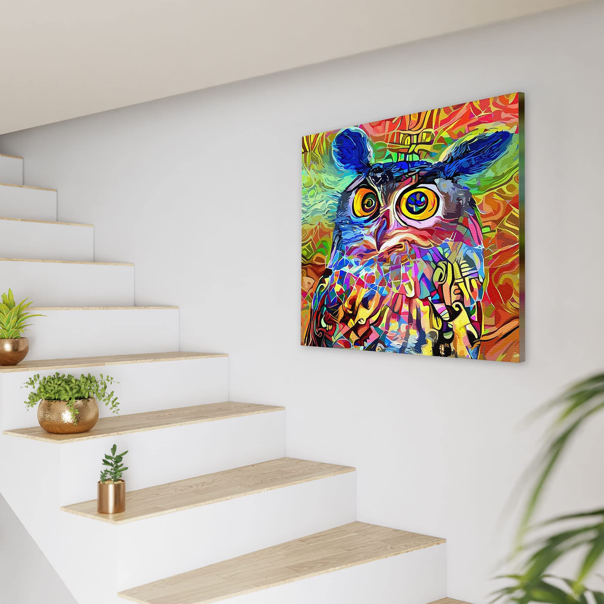 Colorful geometric mosaic owl with vibrant swirling and abstract patterns on square canvas wall art above modern staircase