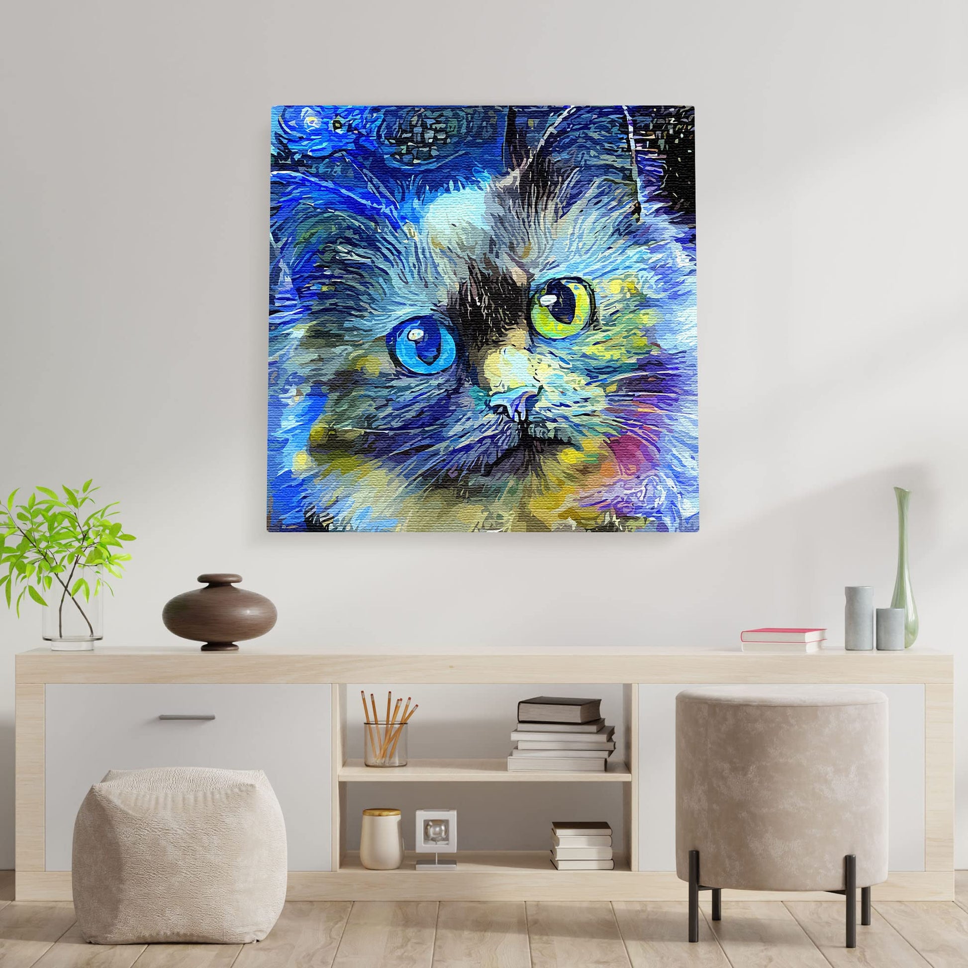 Blue cat canvas art with vibrant abstract brushstrokes and colorful heterochromatic eyes displayed above minimalist wooden console table