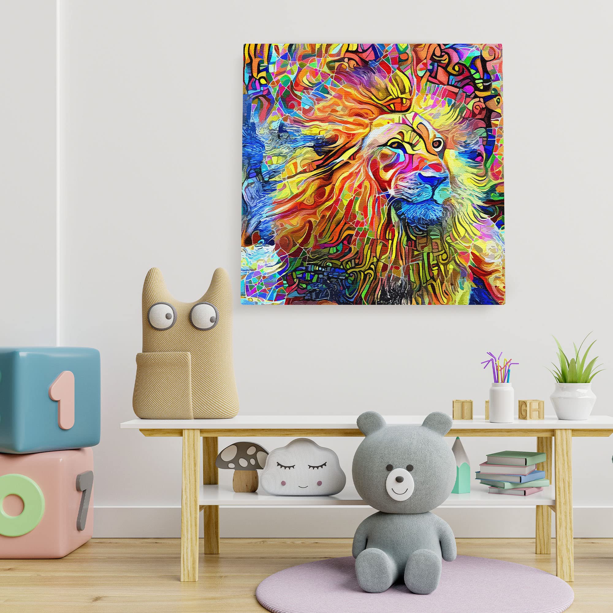 Vibrant colorful abstract lion artwork on square canvas displayed on white kids room wall above playful toys and books