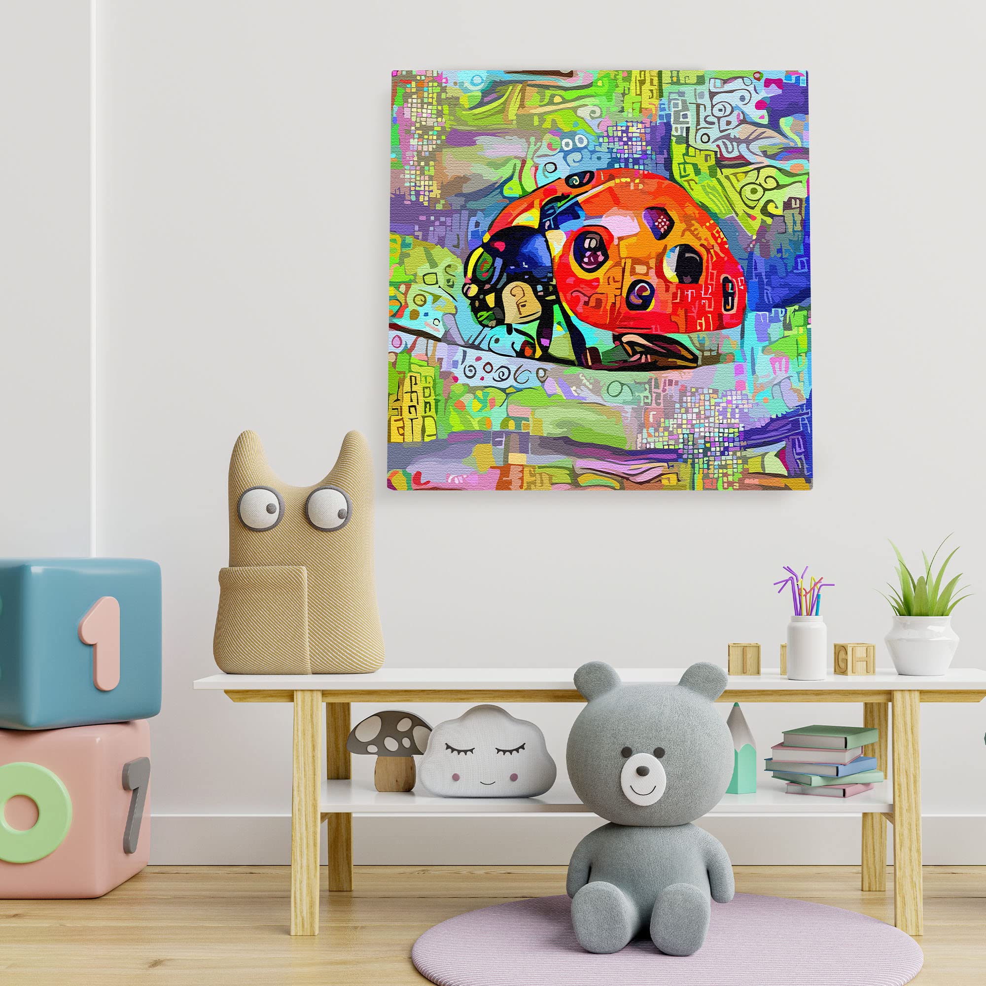 Abstract ladybug wall art with vibrant multicolor geometric patterns on textured canvas in playful children's room setting