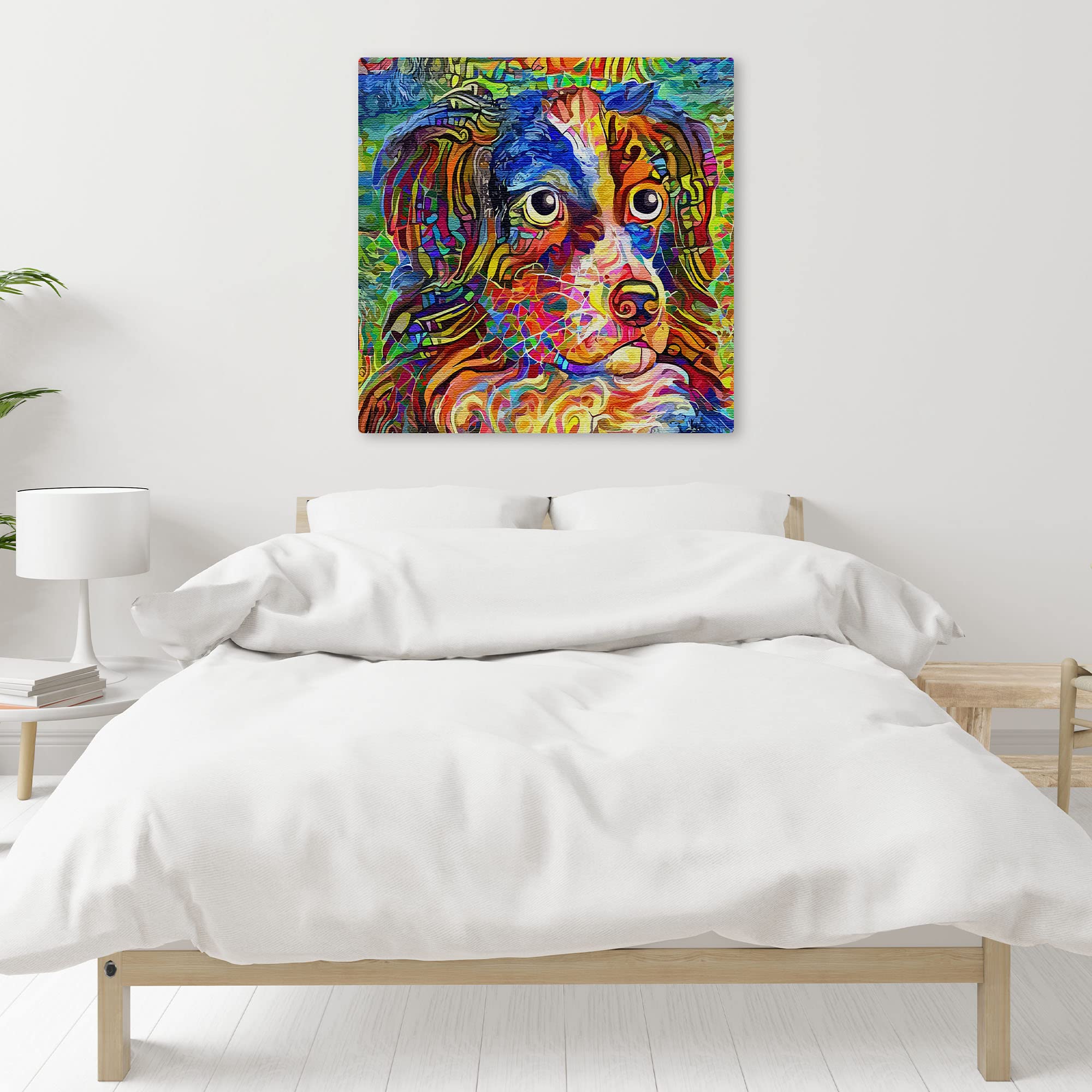 Colorful abstract Border Collie dog art with vibrant multicolor brush strokes on canvas hanging above minimalist bedroom bed