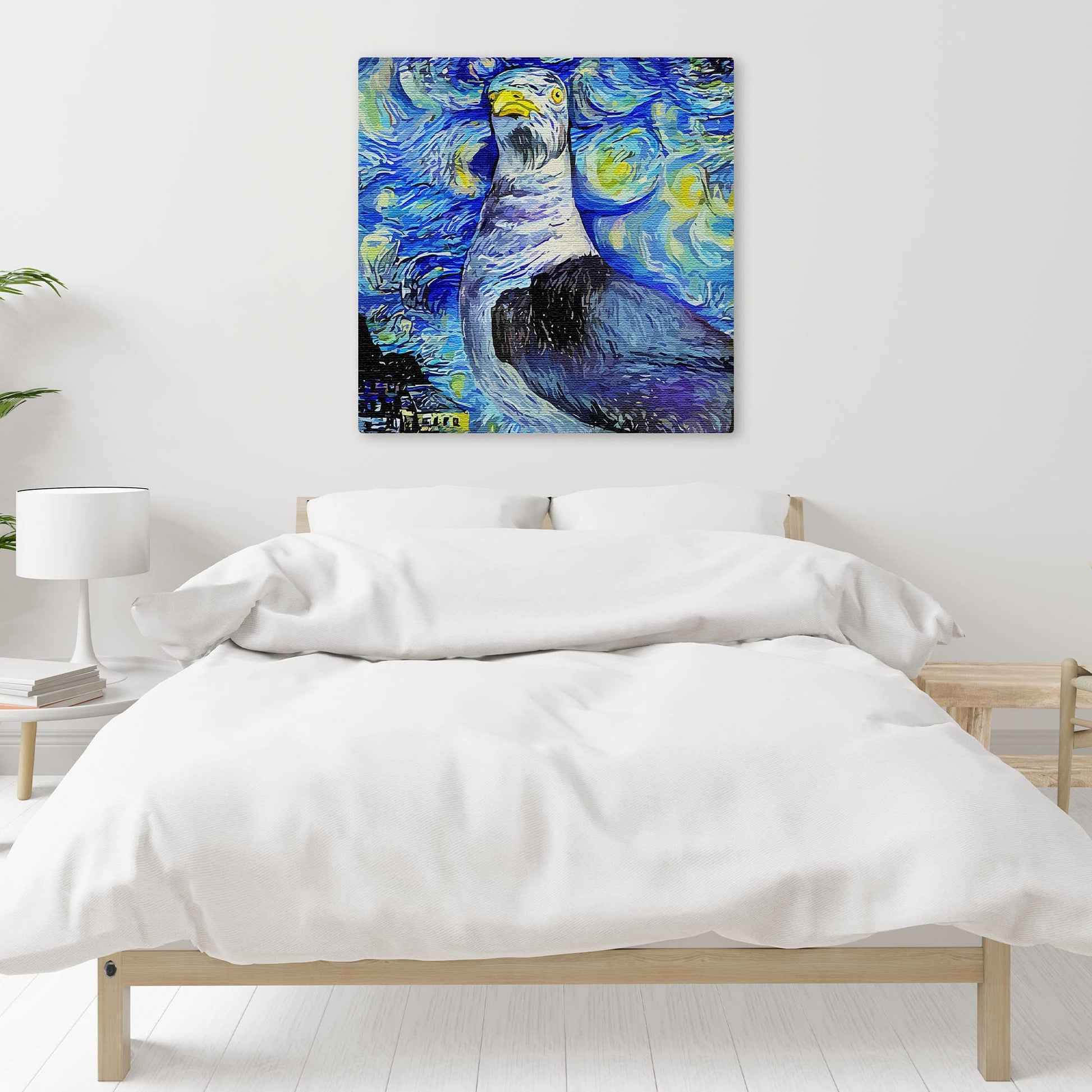 Blue abstract seagull with swirling starry night sky and dynamic brushstroke patterns on square canvas wall art above bed
