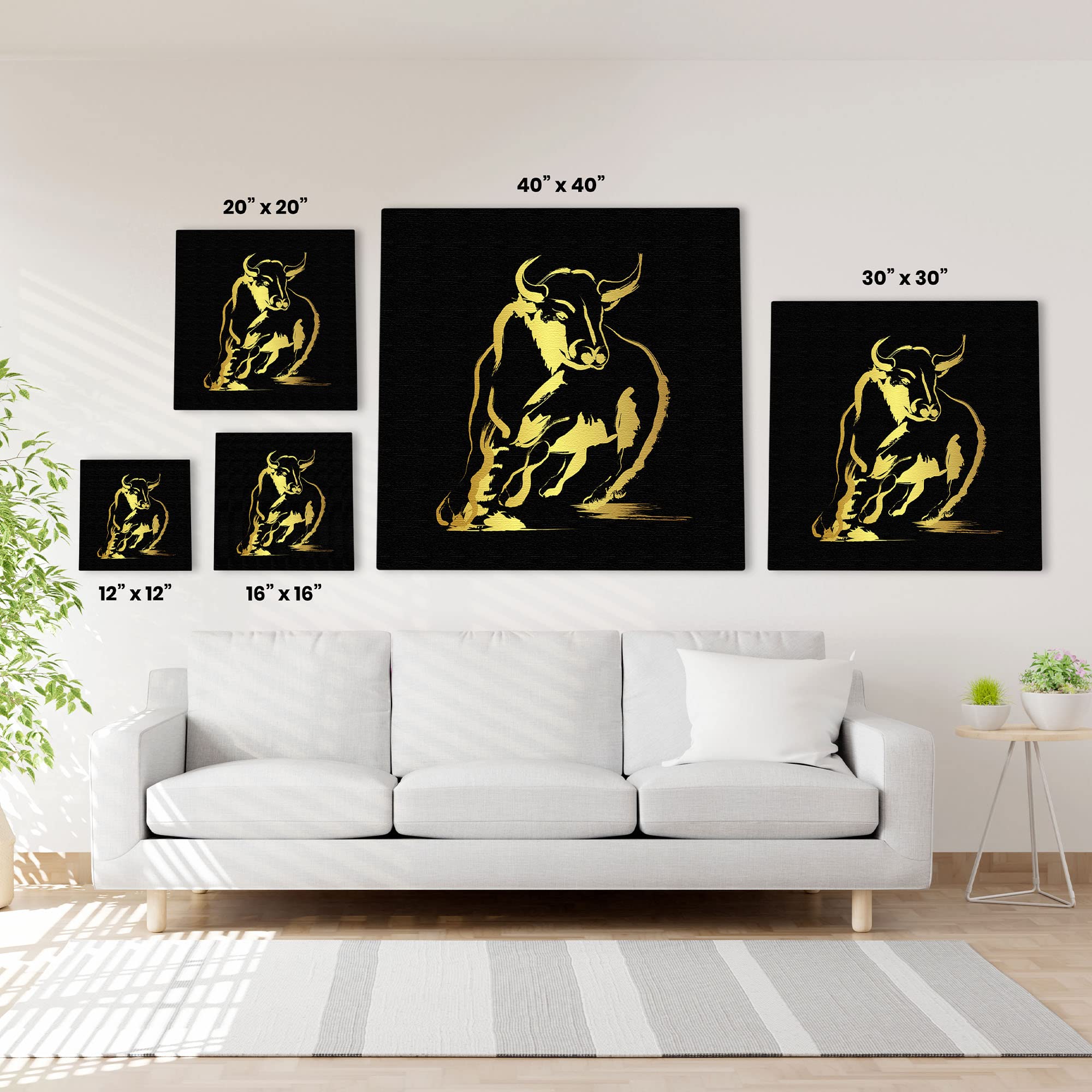 Abstract black and gold bull art in multiple size options displayed on white wall above modern white sofa in living room