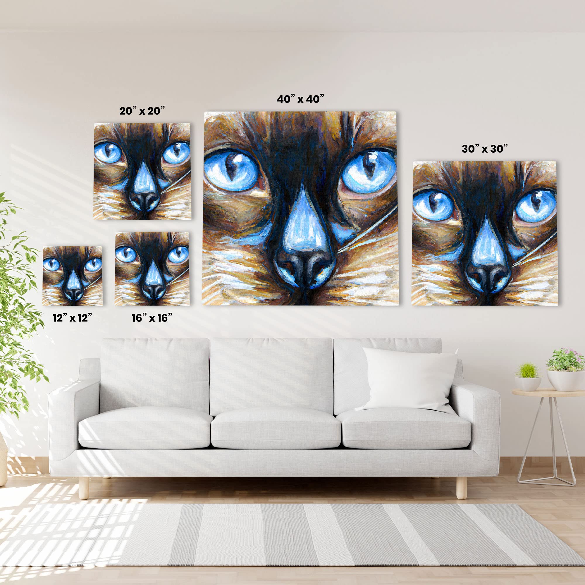 Close-up Siamese cat wall art drawing with vivid bright blue eyes and detailed brush strokes on various sized square canvases above sofa