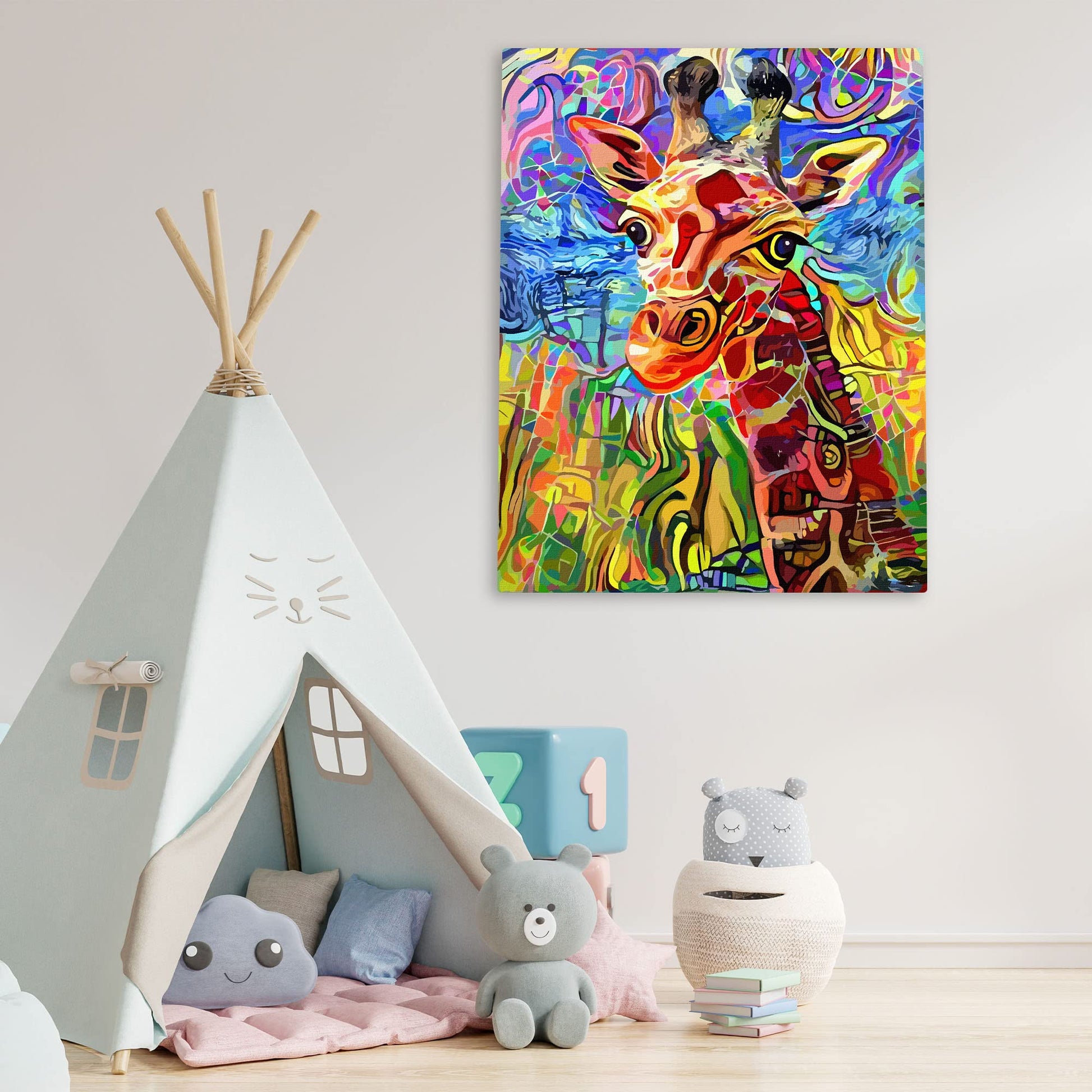 Abstract colorful giraffe portrait with vibrant swirling patterns printed on canvas hanging on white wall in playful kids room
