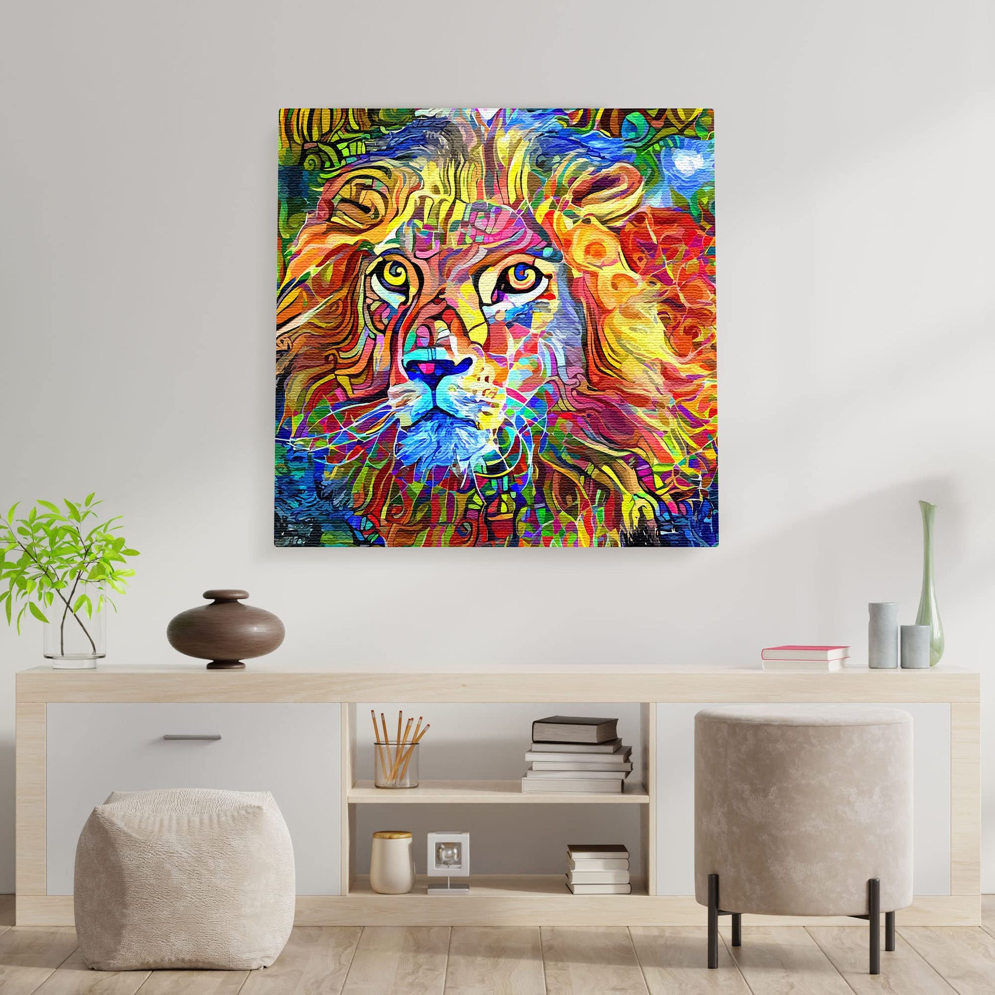 Vibrant colorful abstract king of the jungle lion artwork on square canvas displayed on white wall above modern console table