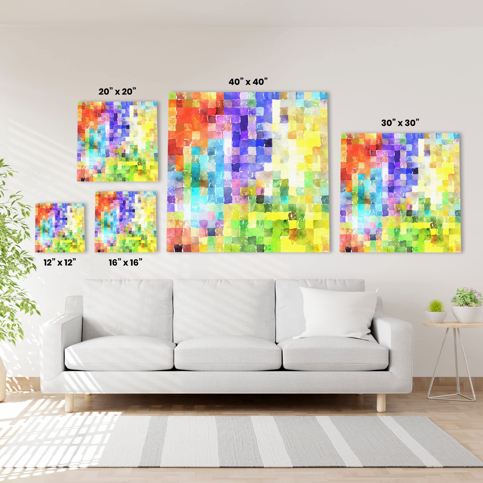 Colorful abstract watercolor mosaic wall art in varying sizes displayed above white sofa in bright living room