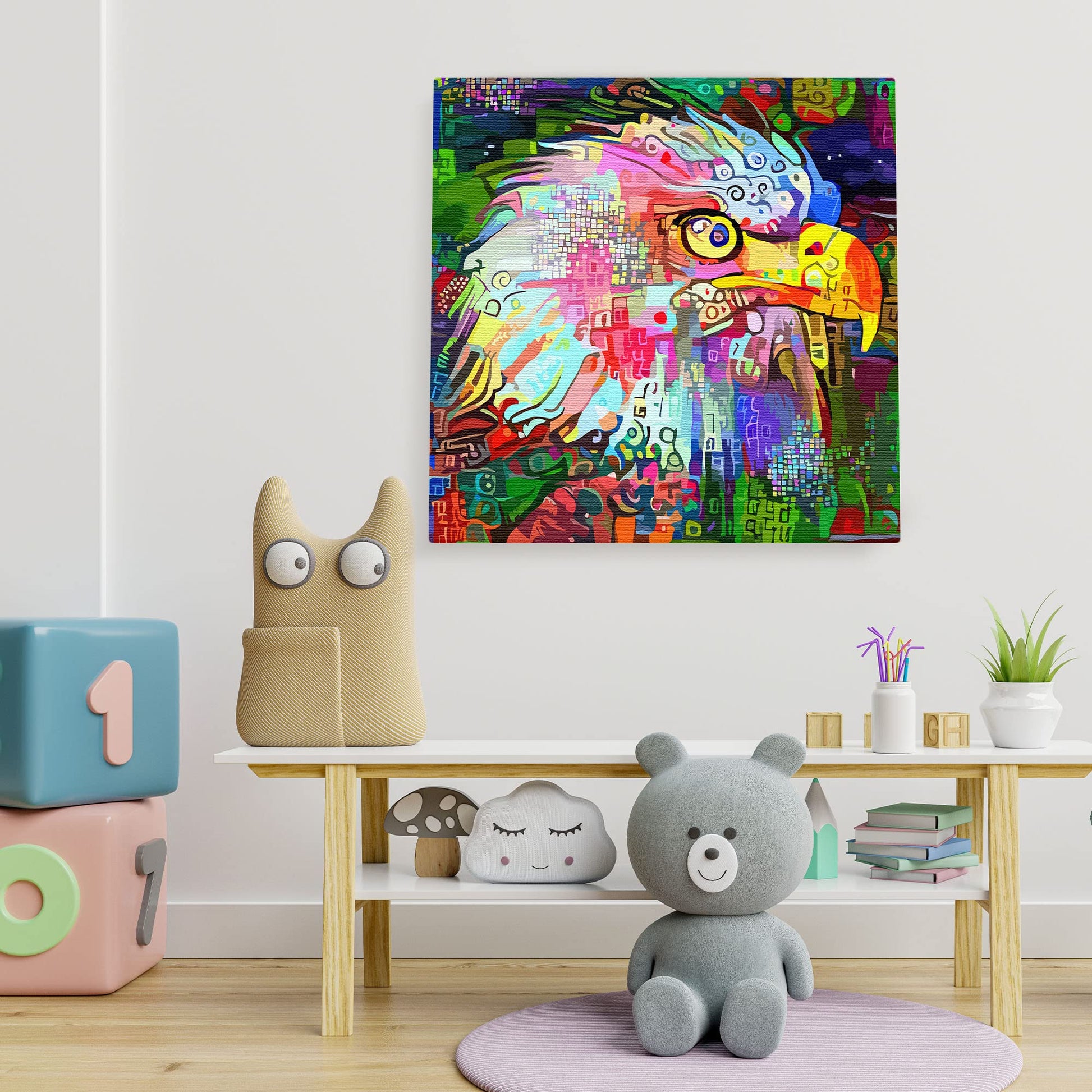 Colorful abstract eagle wall art with geometric patterns on square canvas in playful children's room setting