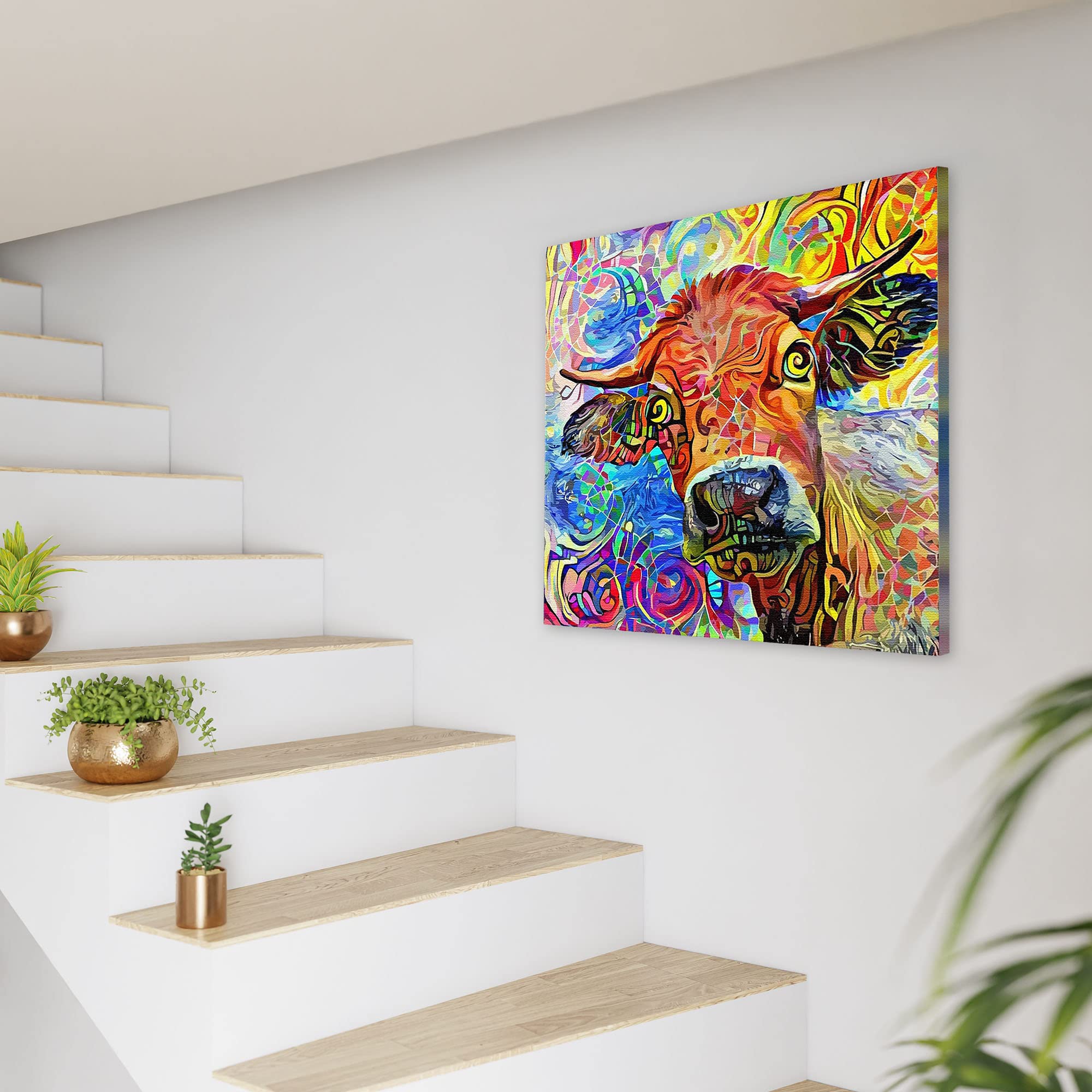 Vibrant colorful abstract cow painting with swirling patterns on square canvas displayed on white wall near staircase