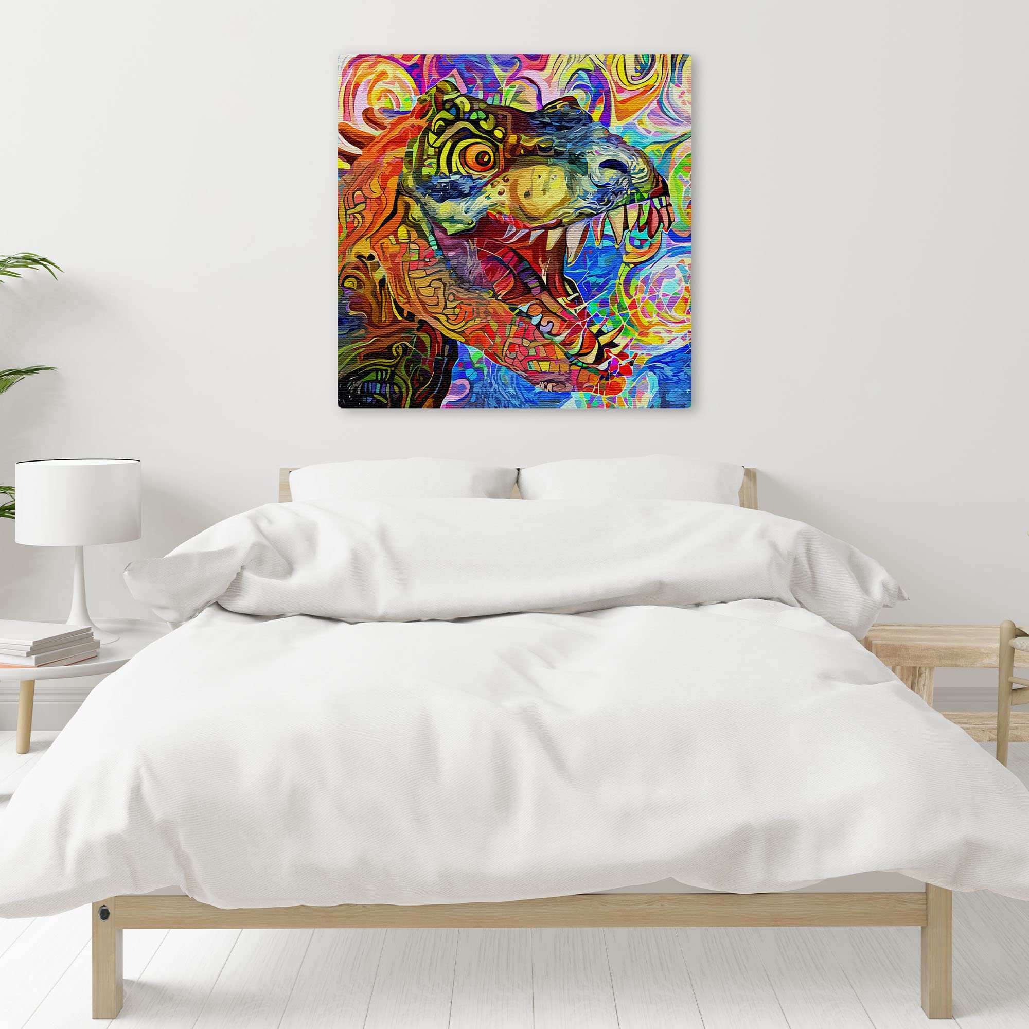 Vibrant colorful geometric mosaic T-Rex dinosaur wall art with bold abstract patterns on square canvas above bed