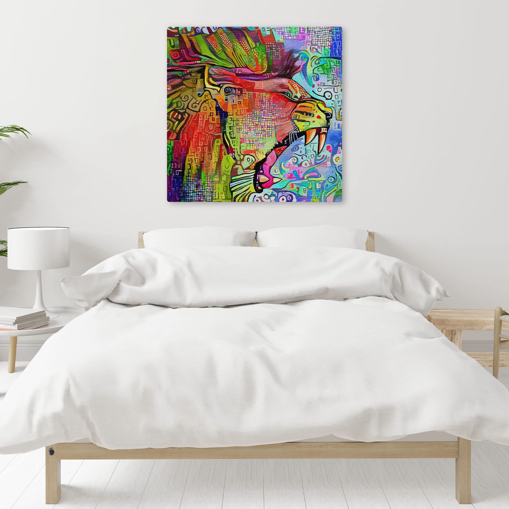 Vibrant abstract roaring lion artwork on square canvas displayed on white bedroom wall above wooden bed with modern decor