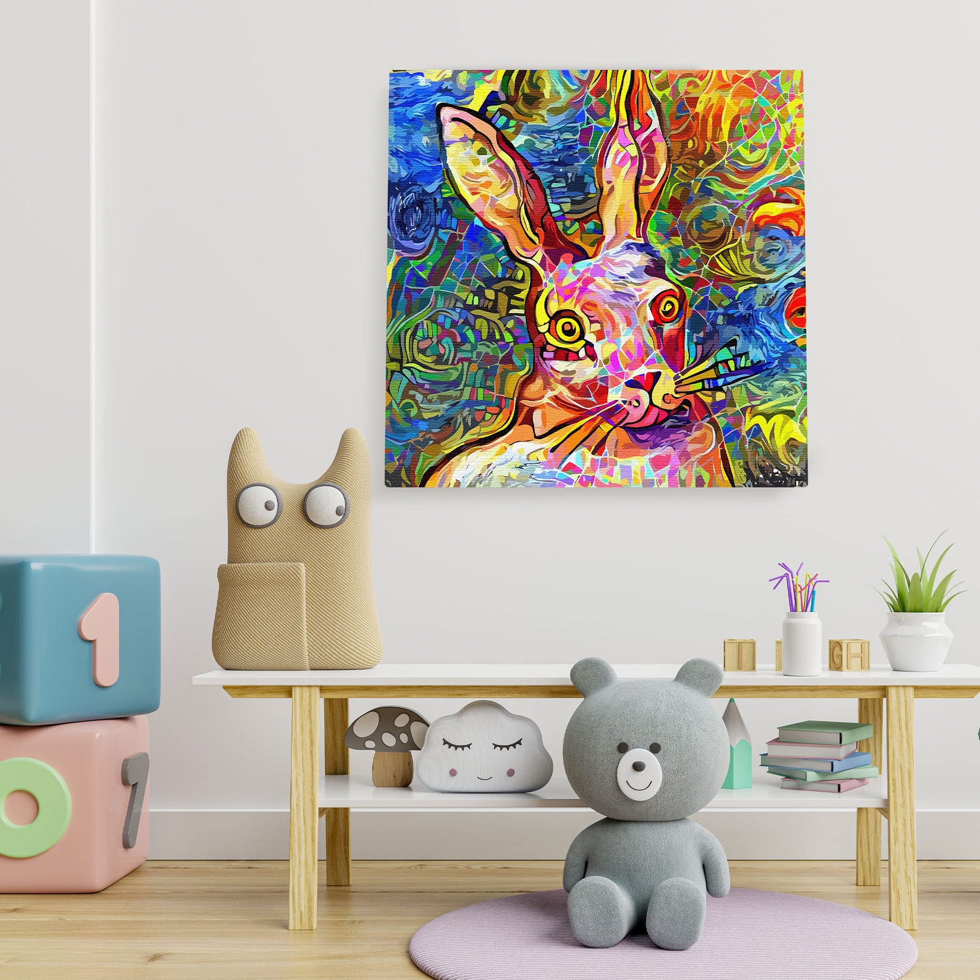 Abstract colorful bunny rabbit with vibrant geometric and swirling digital patterns on square canvas wall art above children's playroom bench