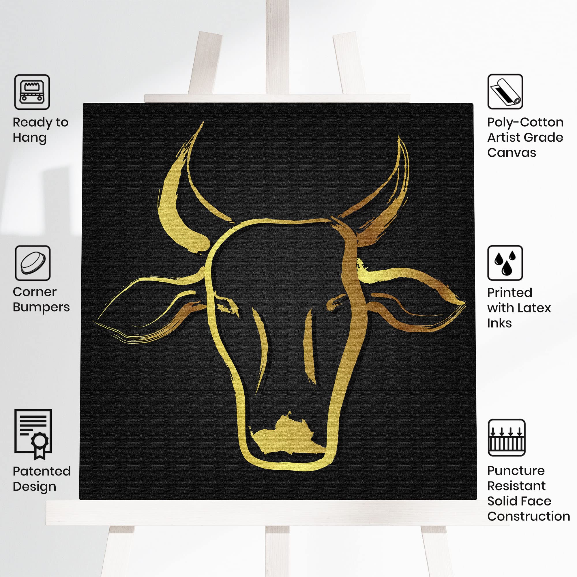 Black and gold abstract cow art with sleek brushstroke design on square canvas displayed on white easel