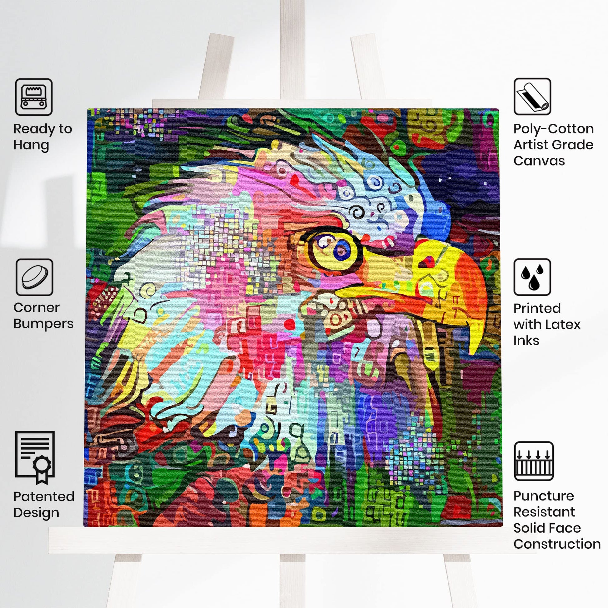 Colorful abstract eagle head wall art with geometric shapes and vibrant patterns on square canvas displayed on easel