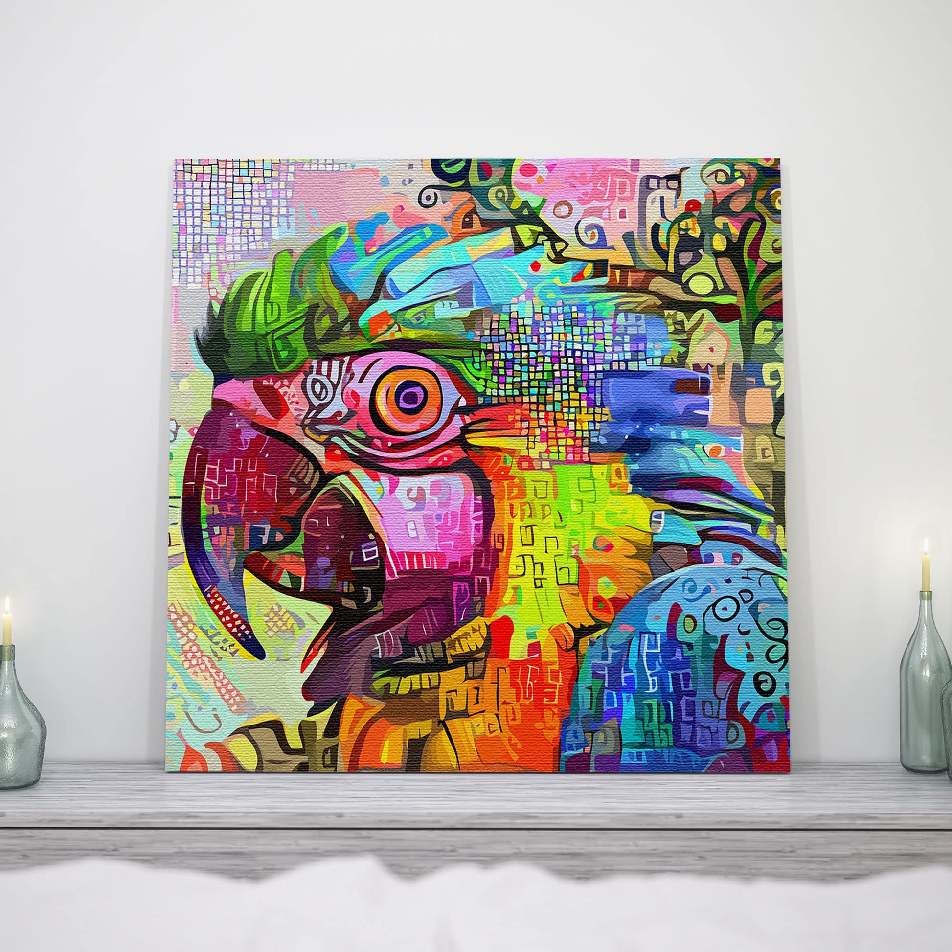 Colorful abstract macaw with vibrant geometric and mosaic patterns on square canvas wall art on wooden mantel with candles