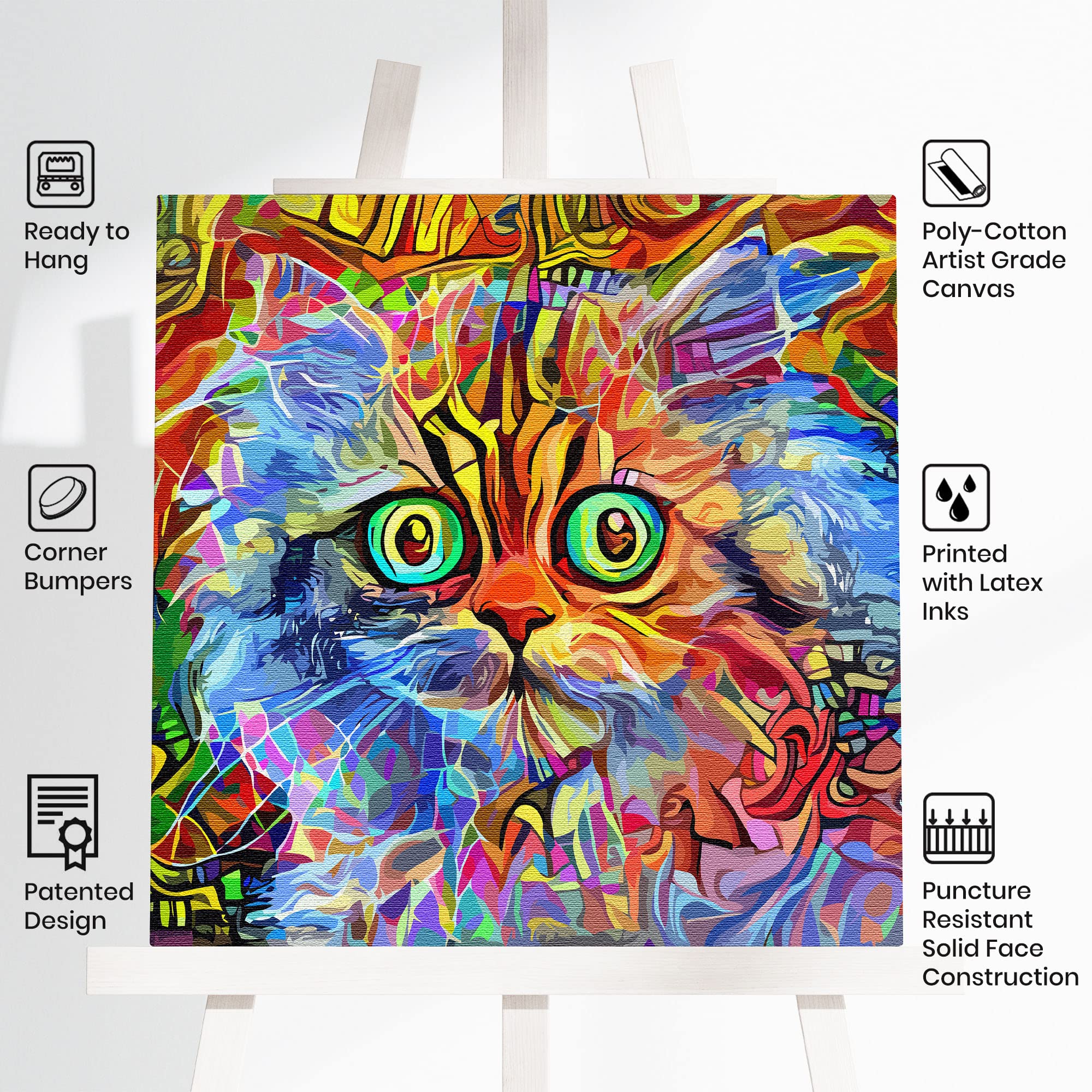 Multicolor cat wall art with vibrant geometric patterns and striking green eyes on square canvas displayed on white easel