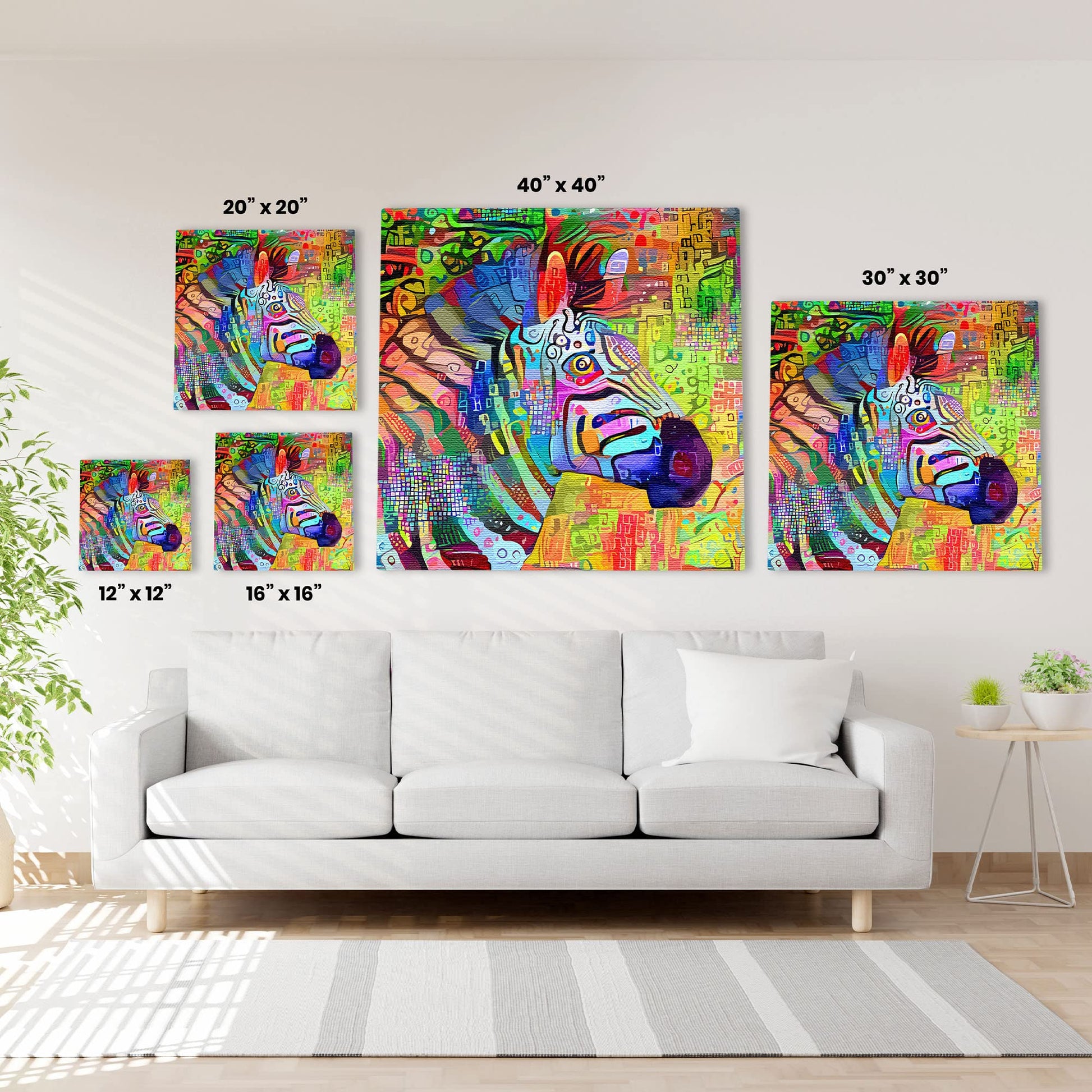 Vibrant multicolored abstract zebra head printed on canvas shown in five different sizes hanging above white sofa in modern living room