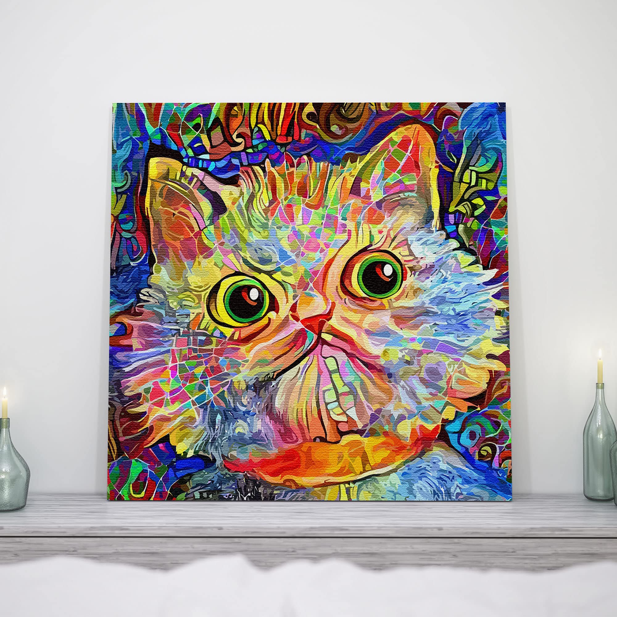 Colorful funny cat wall art with vibrant abstract mosaic patterns on square canvas displayed on mantel with candles