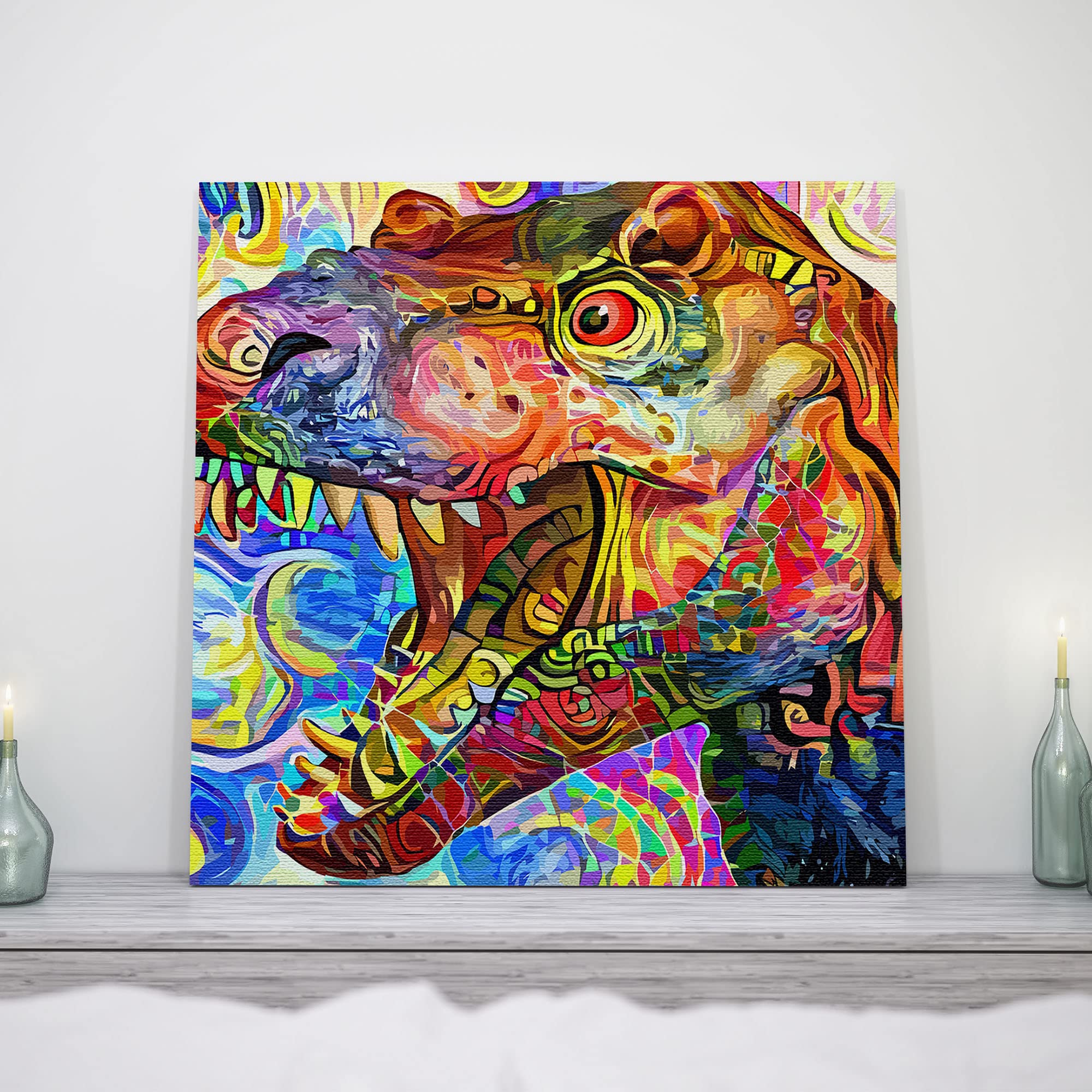Colorful abstract geometric mosaic T-Rex dinosaur wall art with bold vibrant patterns on square canvas displayed on wooden surface