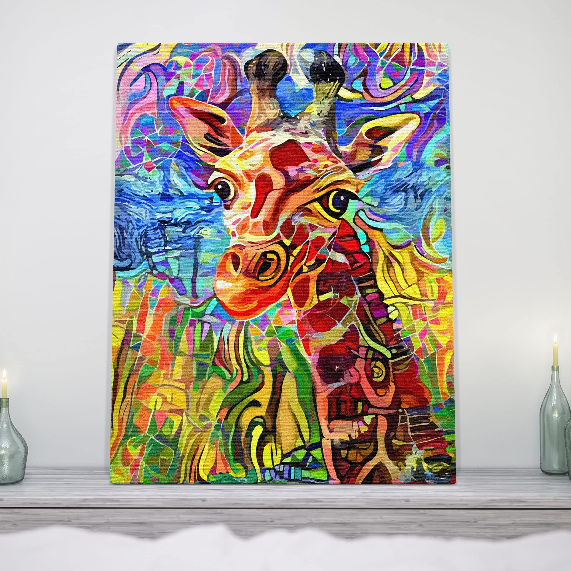 Colorful abstract giraffe portrait with vibrant patterns printed on canvas displayed on shelf between decorative bottles